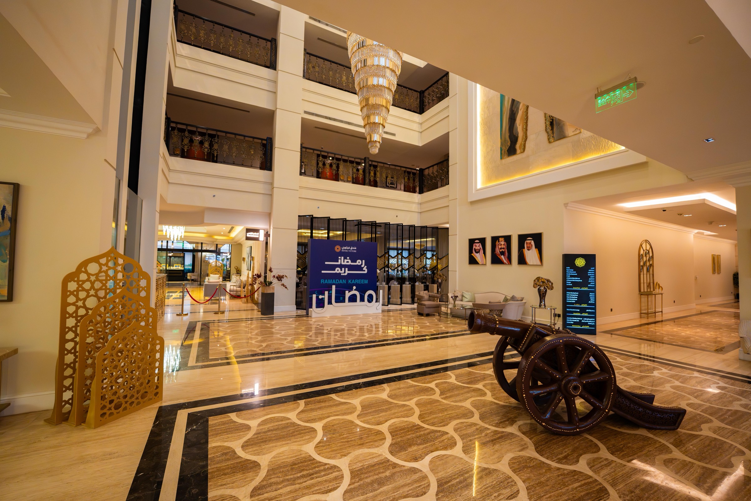 The grand hall, its patterned marble floor running the length of the building