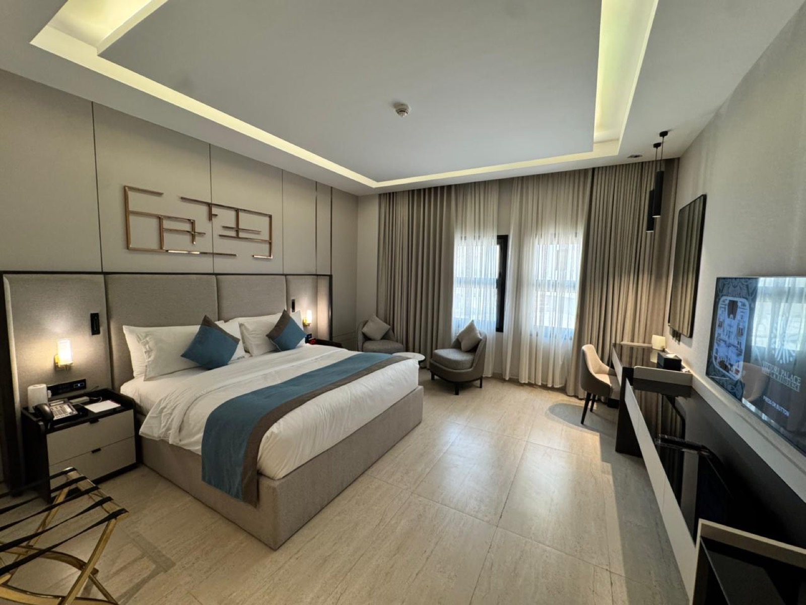 Clear floor space between the bed, the window seating and the desk
