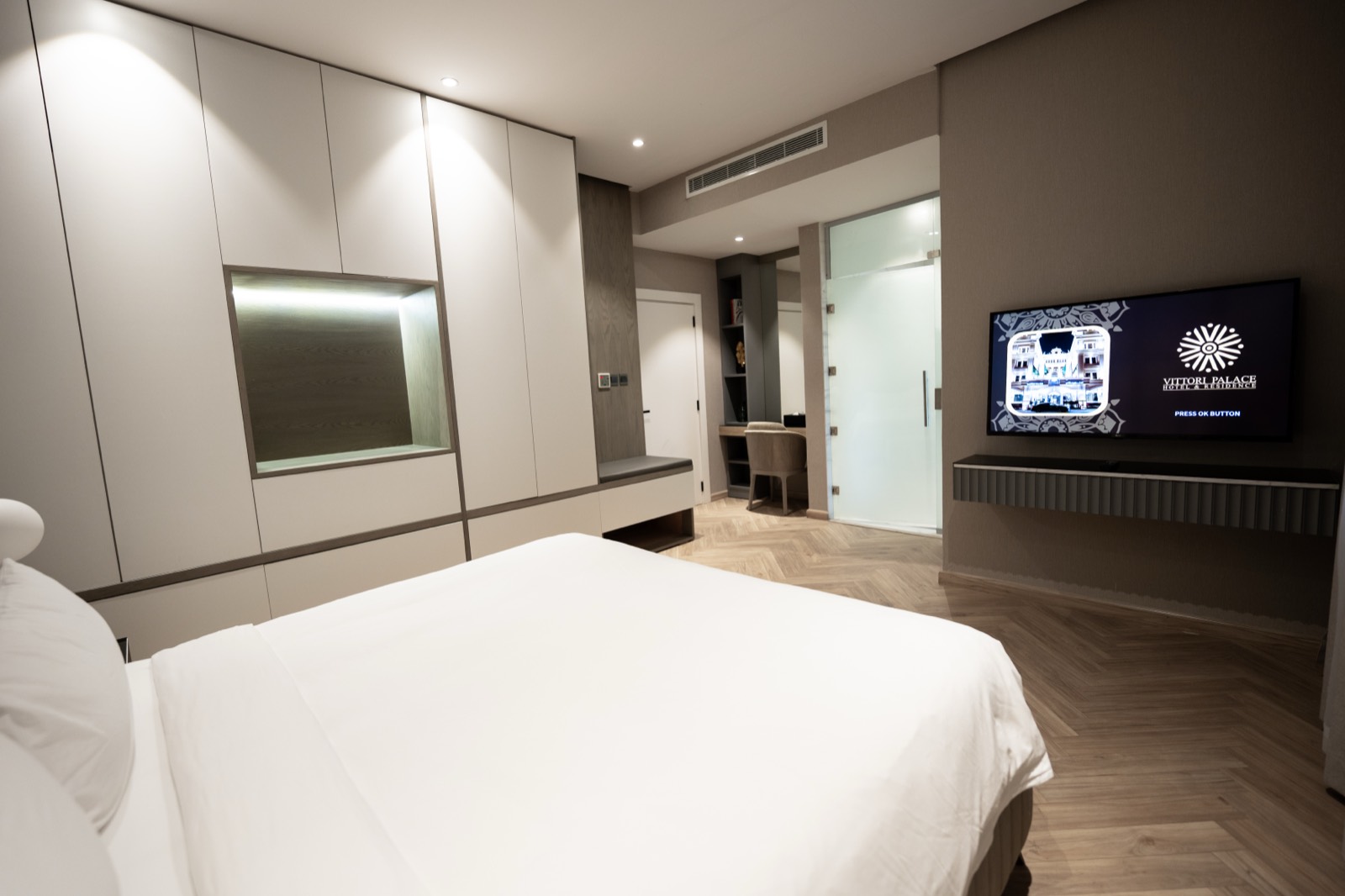 A villa bedroom with its own television