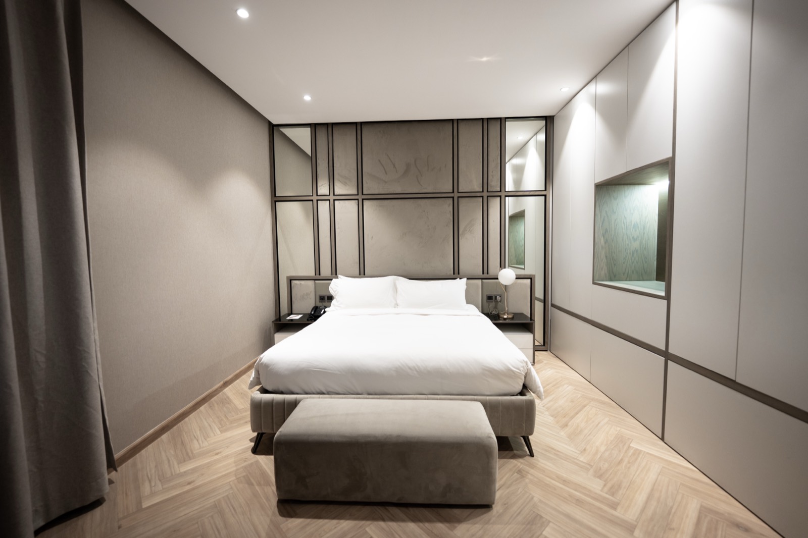 A villa bedroom with a king bed